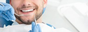 Young man getting a dental checkup - dentist in Manhattan, KS